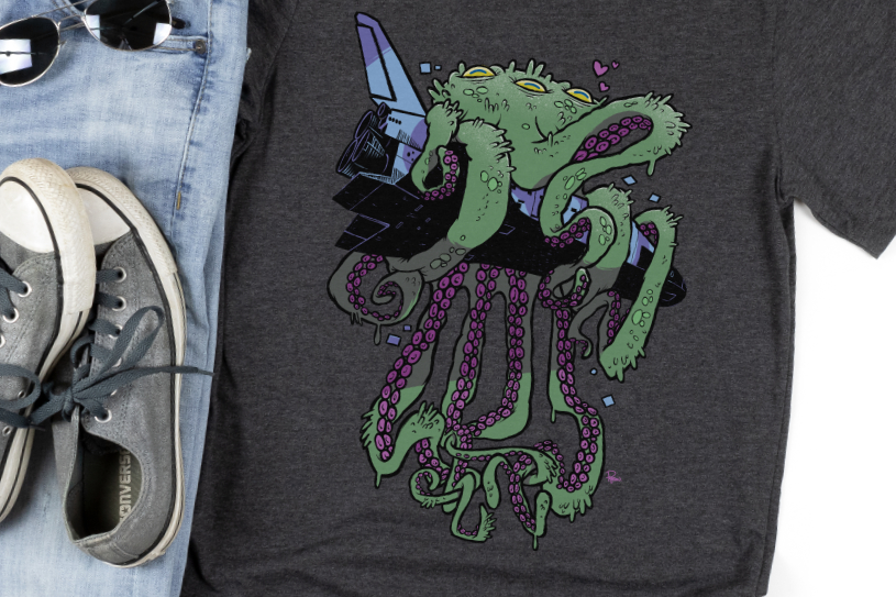 Shirt mockup with an illustration of a space squid lovingly hugging a space shuttle.