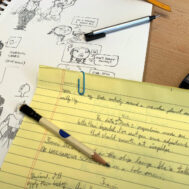 Sketchbook and hand written first draft of new comic.